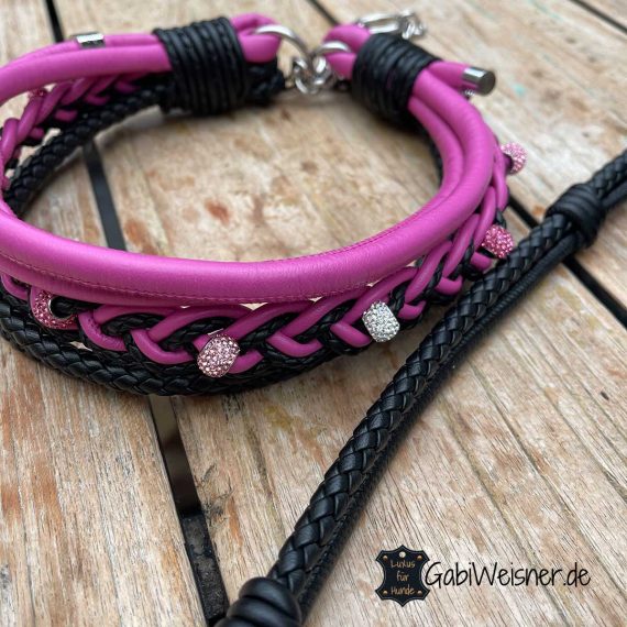 Hundehalsband aus Leder in Pink und Schwarz.